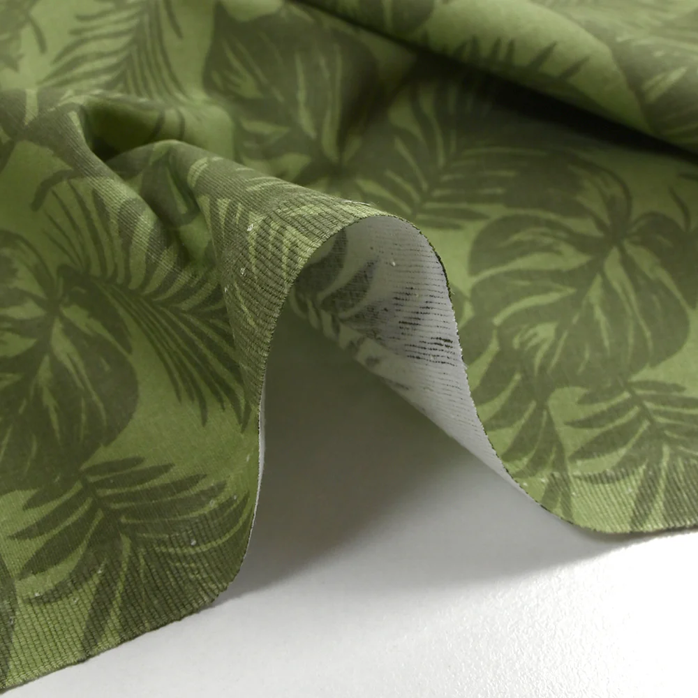 Coton imprimé envolée de feuilles fond vert - Image 6