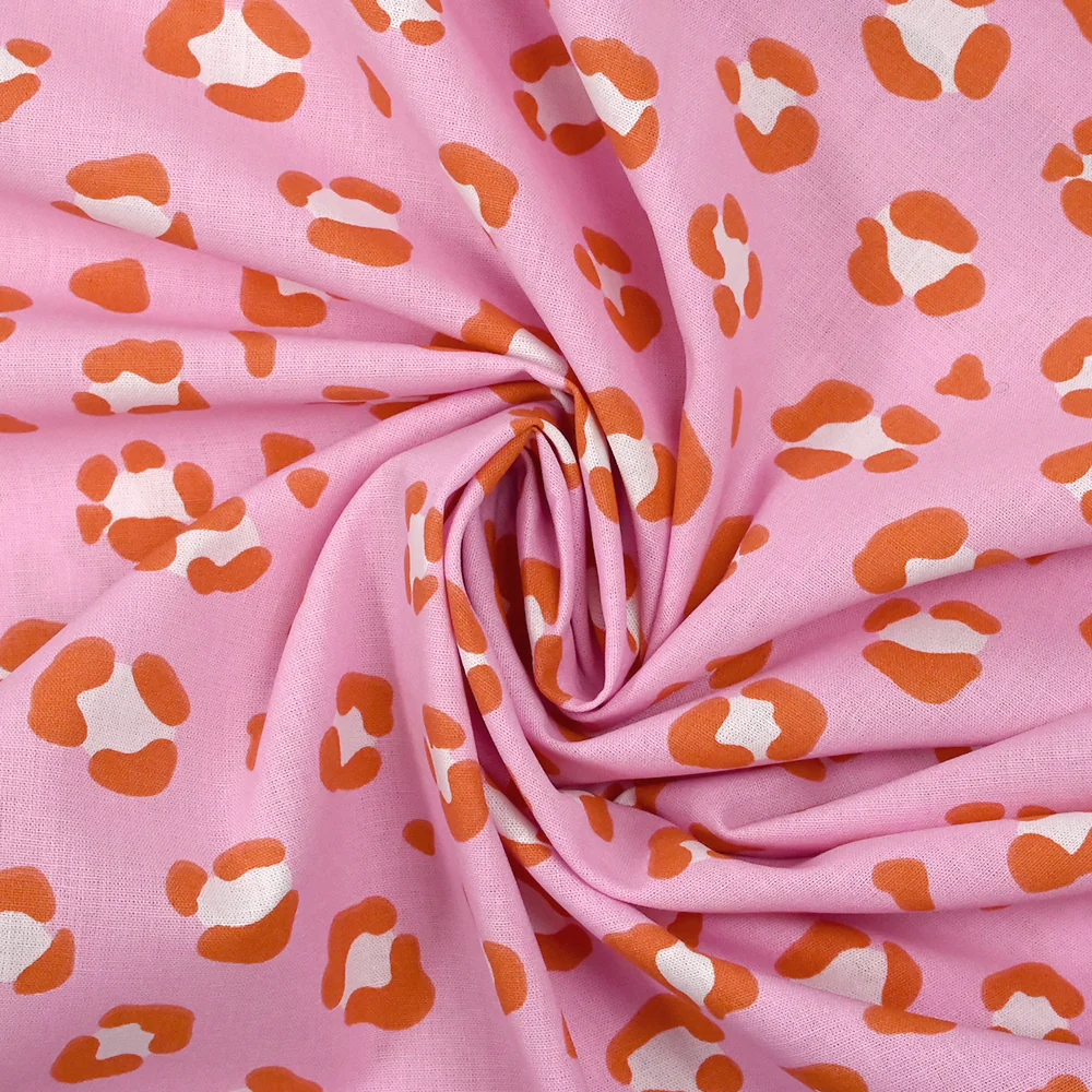Coton imprimé léopard orange brûlé fond rose - Image 2