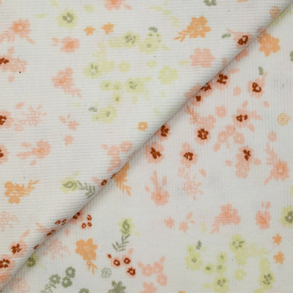 Jersey de coton imprimé fleuri rose et vert fond blanc cassé