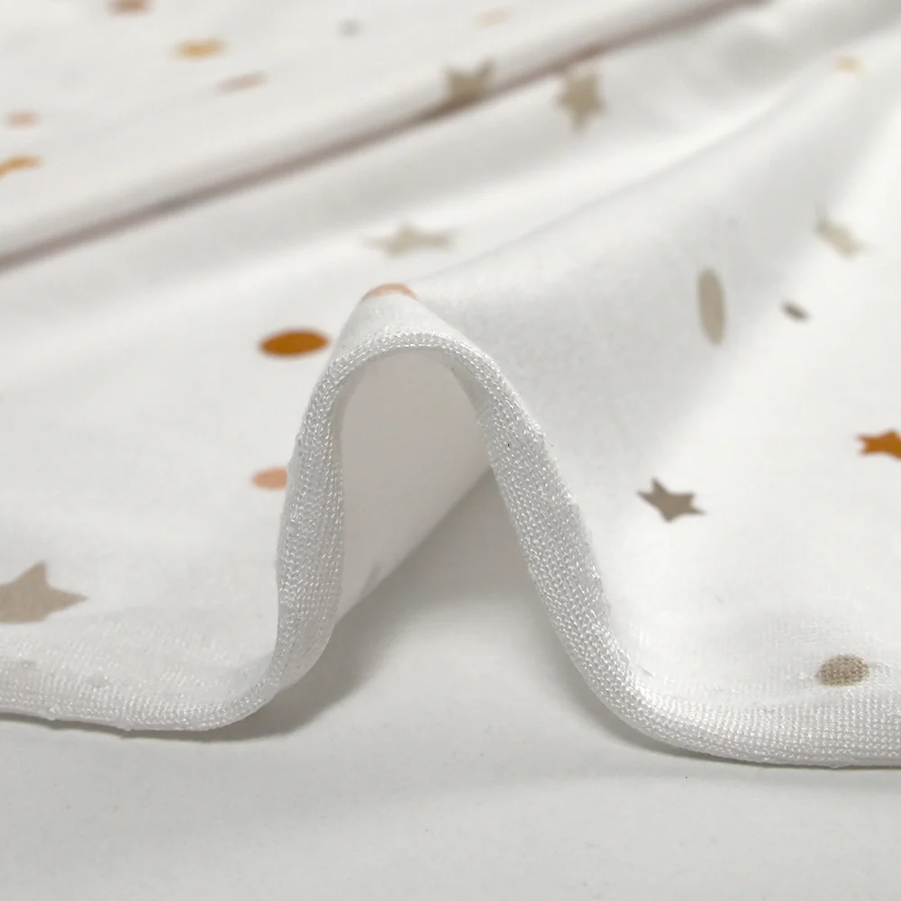 Jersey tout doux imprimé pois et étoiles fond blanc cassé - Image 6