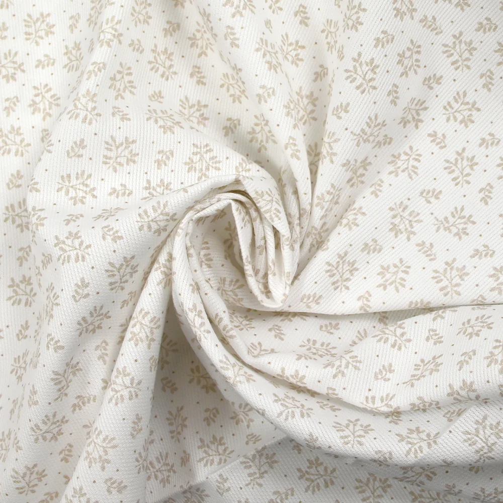 Piqué de coton imprimé brindille dans le vent beige fond blanc - Image 2