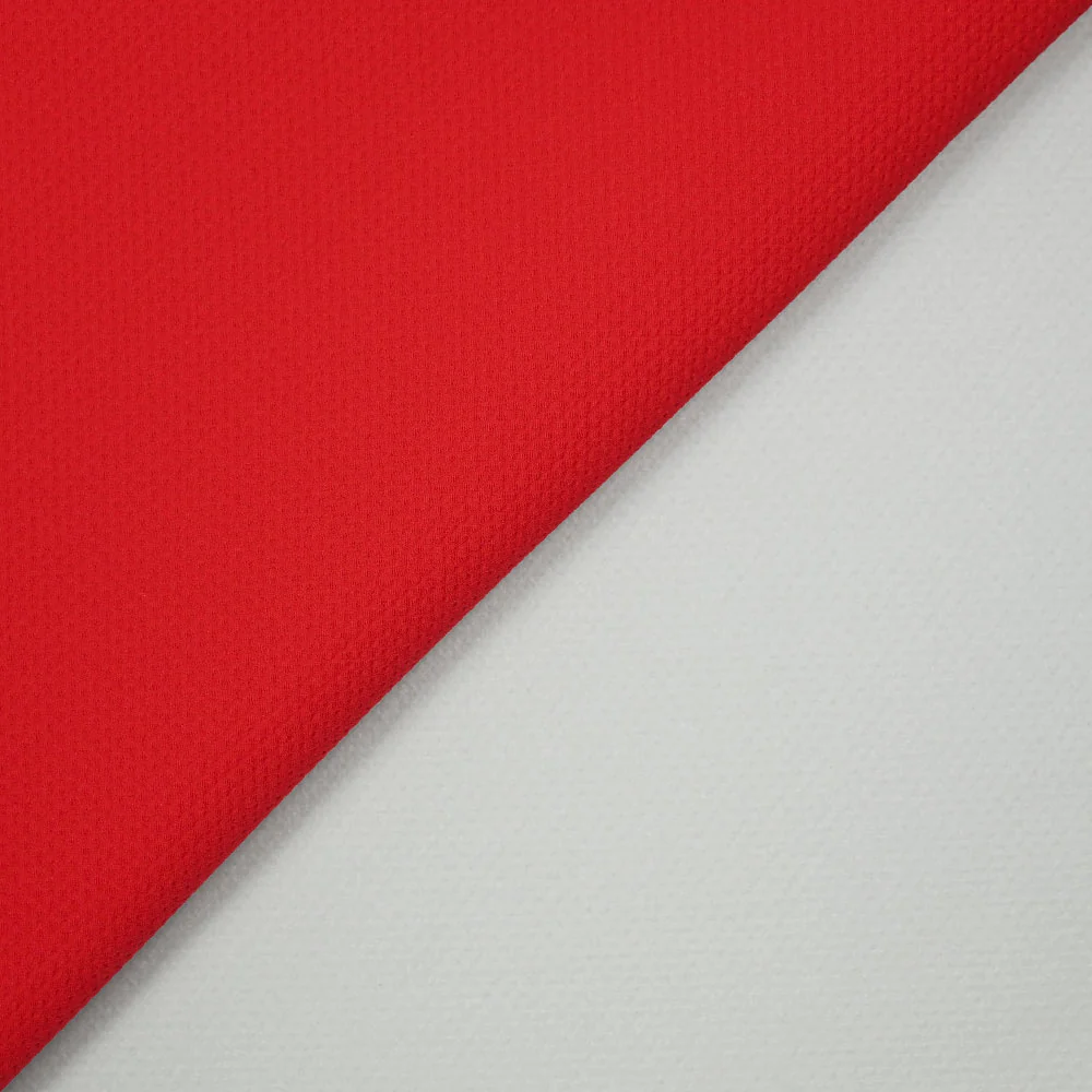Piqué polyester imperméable rouge envers tout doux écru