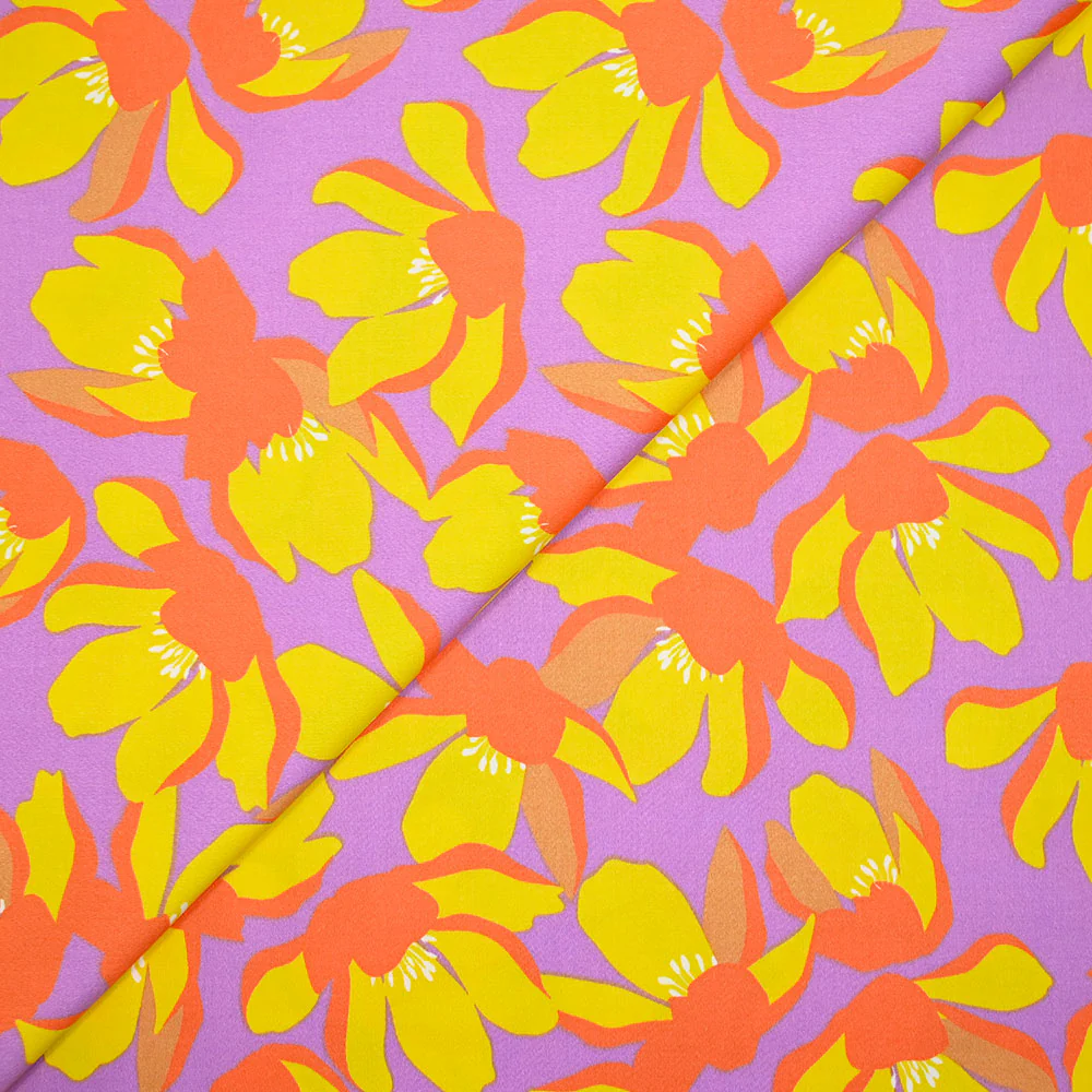 Satin de coton élasthanne fleurs orange fond violet