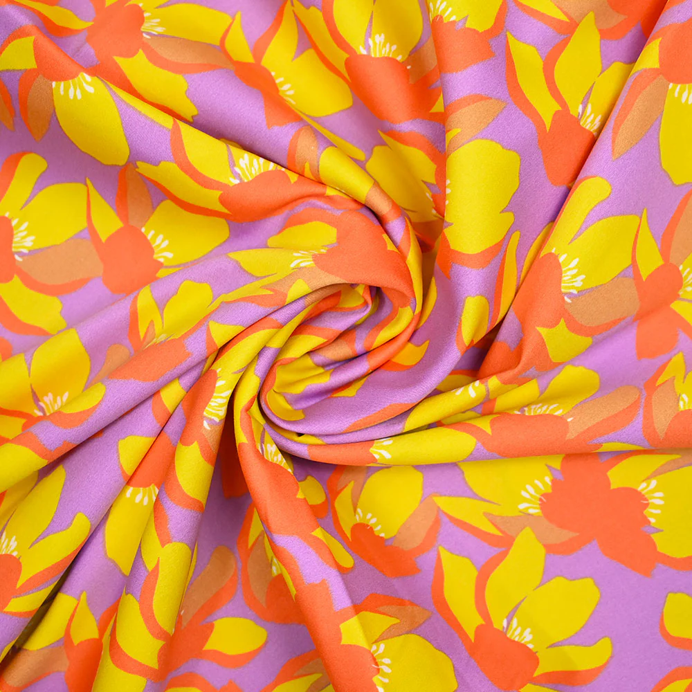Satin de coton élasthanne fleurs orange fond violet - Image 2