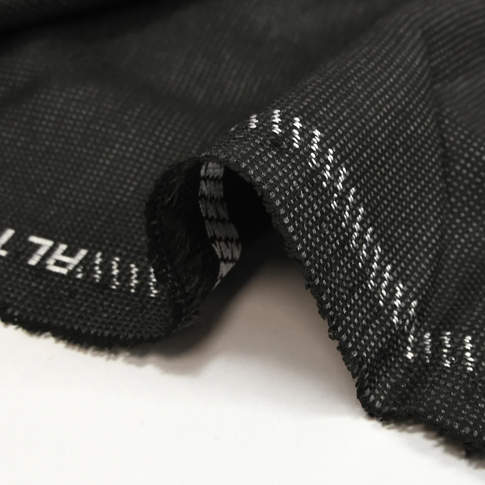 Tissu tailleur laine mélangée fantaisie gris chiné fond noir - Image 6