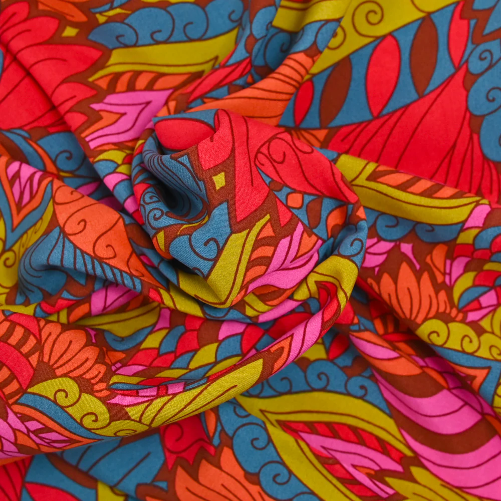 Viscose imprimée sauvage orange et bleu - Image 2